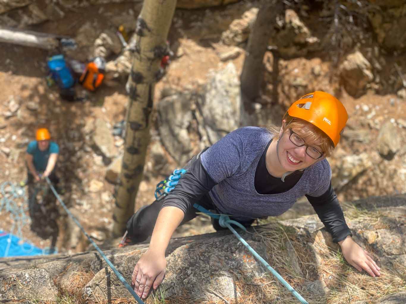 Woman trying top-rope rock climbing on the David Thompson Corridor, near Nordegg, Alberta