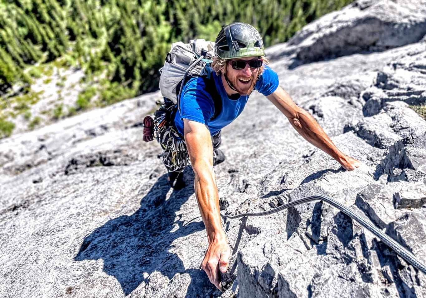 Man multi-pitch rock climb on the David Thompson Corridor, near Nordegg, Alberta