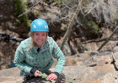 Woman learning to Lead Climb outdoors in Alberta