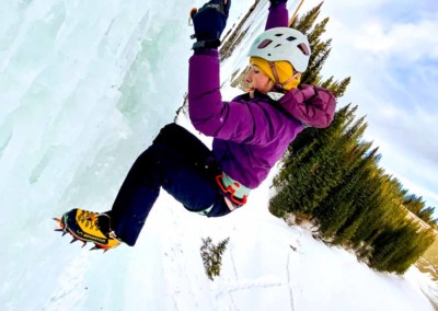 Teenage girl learning to ice climb in David Thompson Country, Alberta