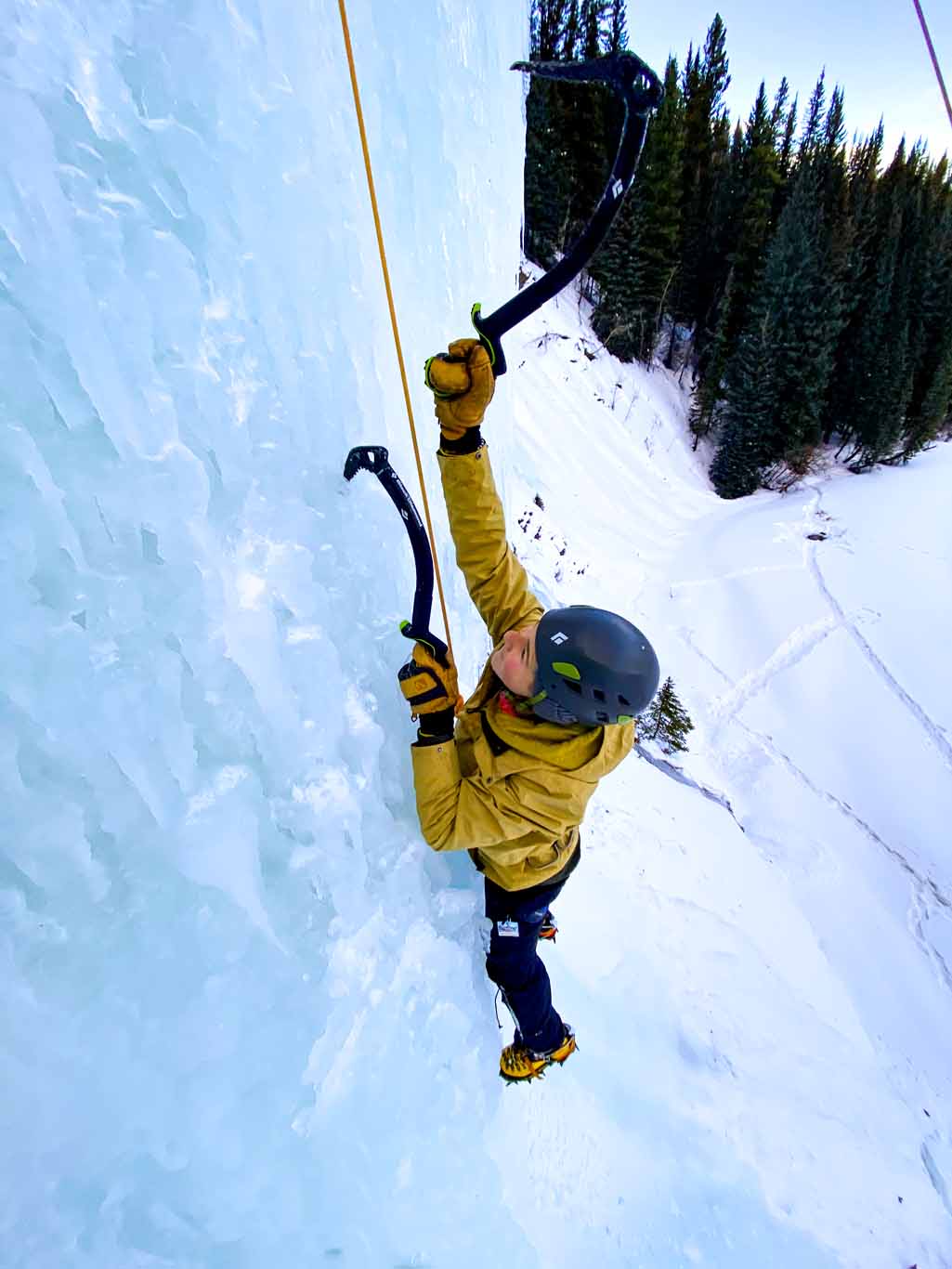 Teenage boy learning to ice climb in David Thompson Country, Alberta