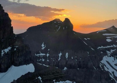 A sunset view from a helicopter of the Alberta Rocky Mountains