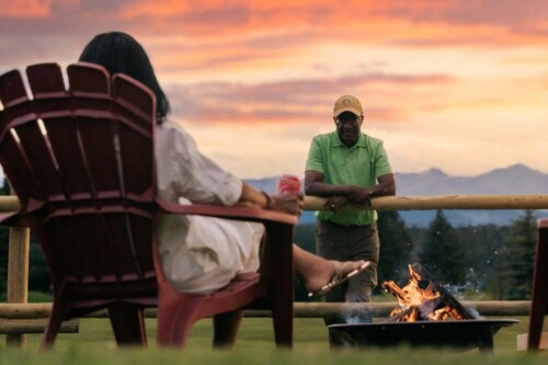 A couple having a picnic at the foot of Coliseum Mountain in Nordegg, alberta