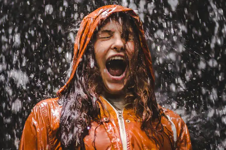 woman in the rain getting wet